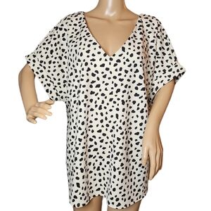 Melloday stretchy black/cream spotted blouse.  Size 1X